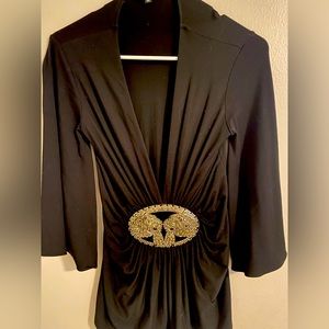 Very classy blouse with a luxurious tiger silver design on it.